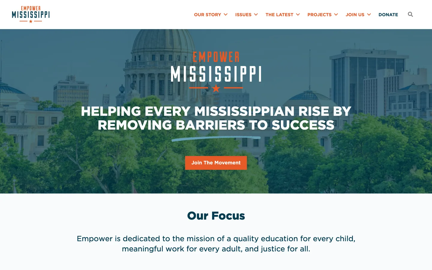 The current empowerms.org homepage: white capitalised text over a tinted photograph of the Mississippi State Capitol
