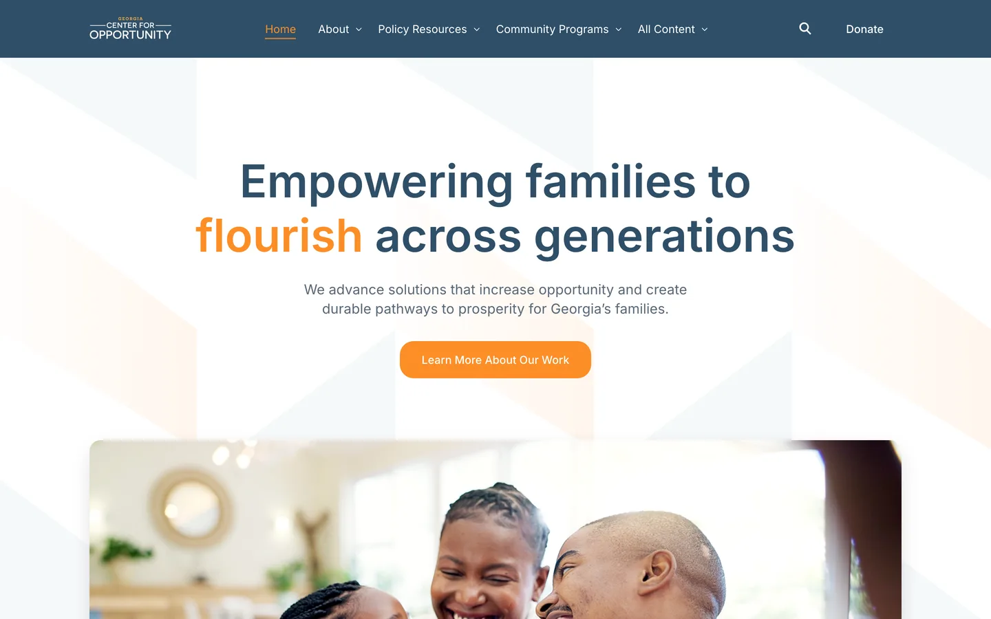 The redesigned foropportunity.org homepage: a headline reading Empowering families to flourish across generations above a photograph of a family at home